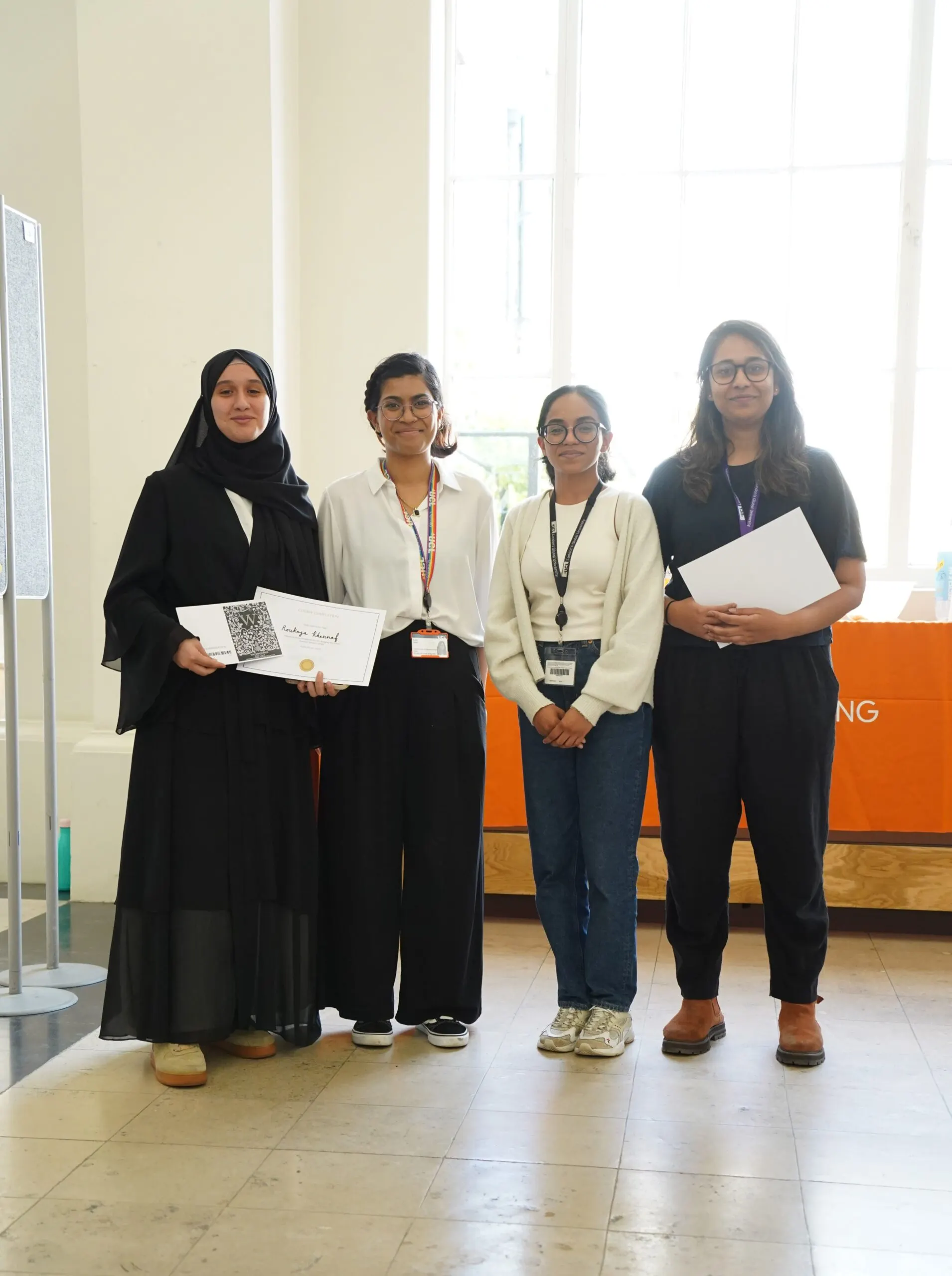 Summer school students with their certificates at University College London